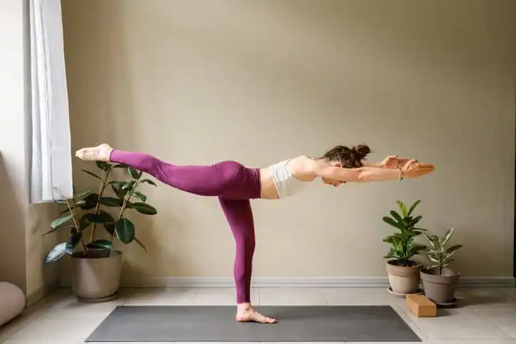 Achieving the Perfect Tone: How Often Should You Exercise for Results? 1 Woman doing Yoga exercise Bloxwich to help with toning the body.